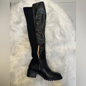 Thigh high black faux leather boots, never worn!